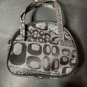 This is a no name brand Coach look alike coin purse